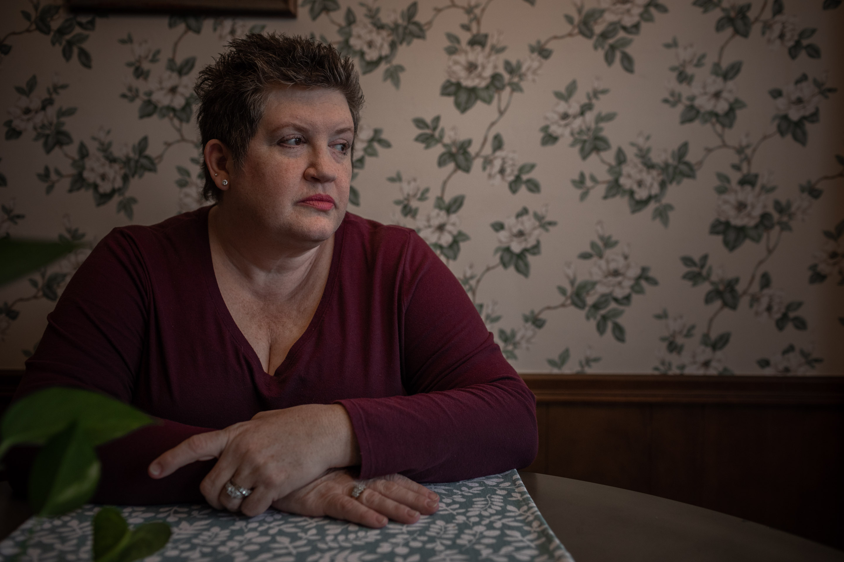 Amy Slagle sits in her kitchen in south Tulsa in Oklahoma. Her daughter Clorinda Archuleta is serving three concurrent life sentences for permitting child abuse and child neglect. Slagle believes her daughter's sentence was excessive.