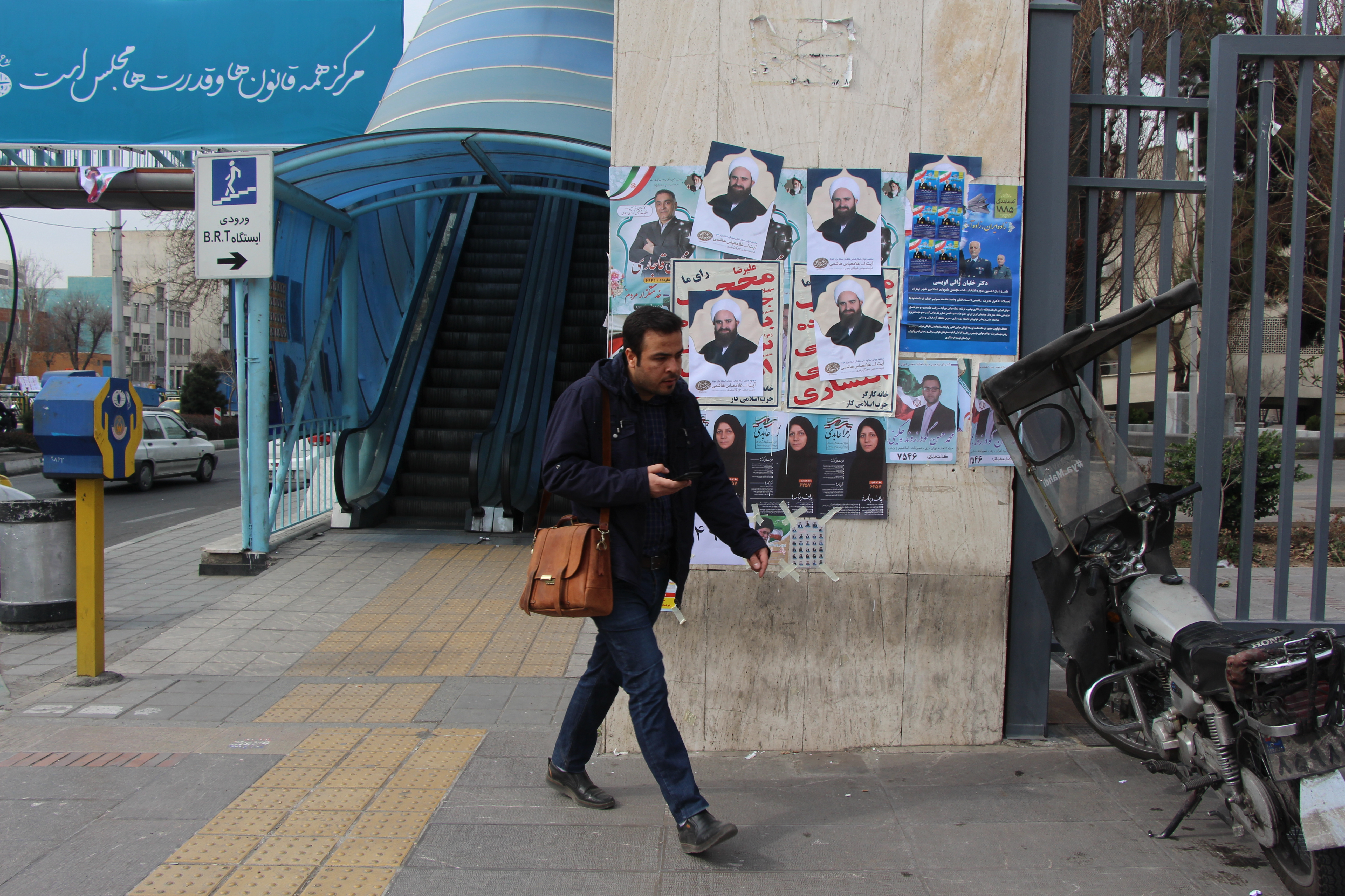 Many Tehran residents ignored the campaign posters and stayed away from the polls. Only 25 percent of Tehran residents voted. Image by Reese Erlich. Iran, 2020. Many Tehran residents ignored the campaign posters and stayed away from the polls. Only 25 percent of Tehran residents voted. Image by Reese Erlich. Iran, 2020.