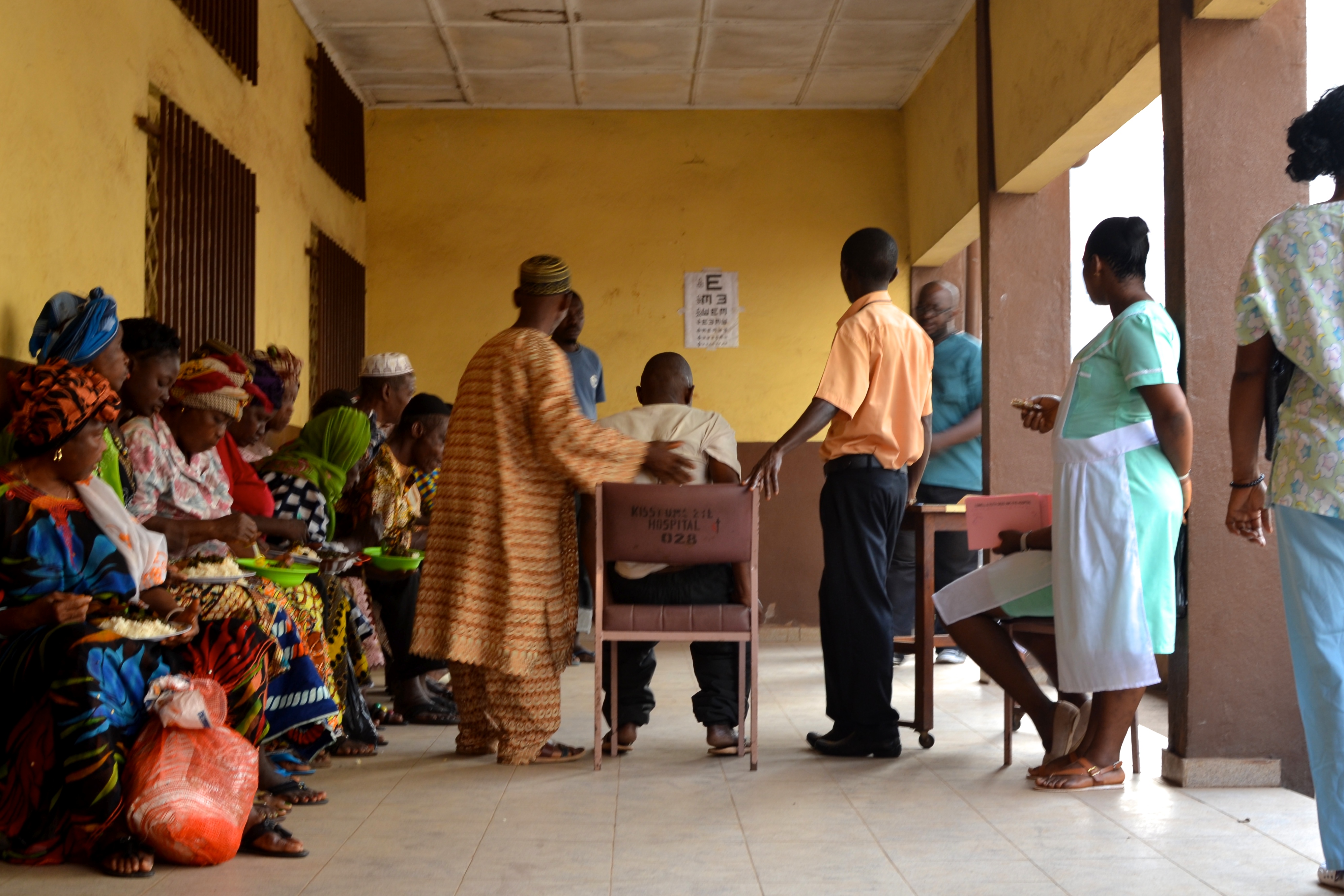 Patients await vision screenings at Freetown’s Lowell and Ruth Gess Kissy UMC Eye Hospital. Image by Emily Baumgaertner. Sierra Leone, 2016.