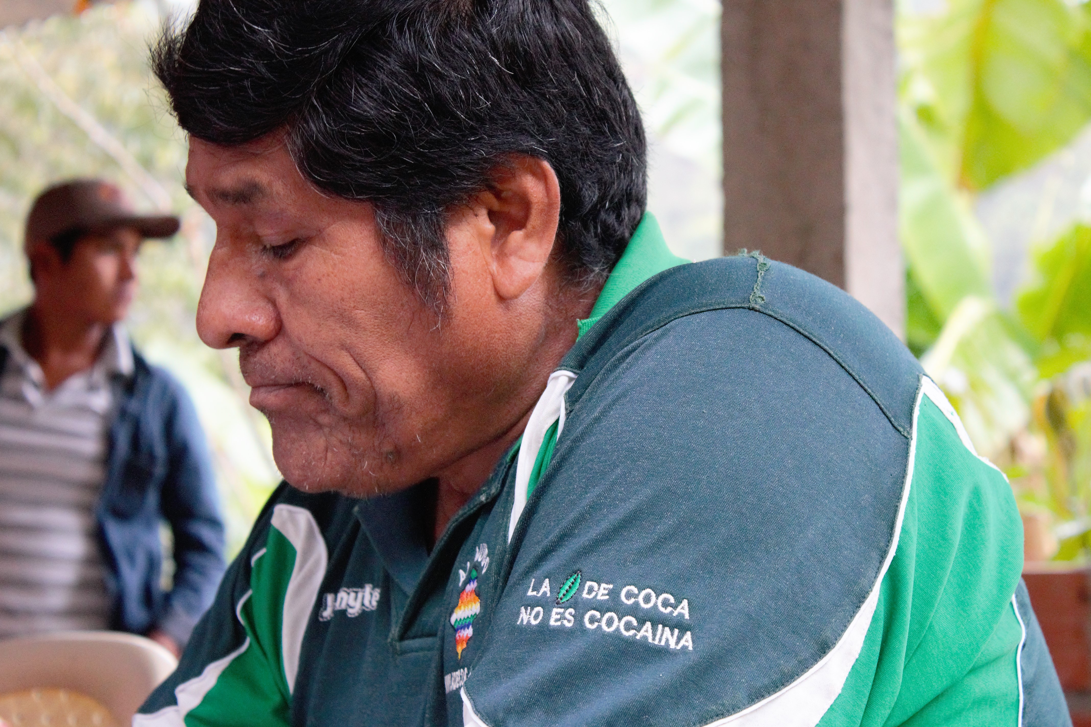 Don Mario, a coca producer in Yungas, Bolivia, has a t-shirt that reads “coca no es cocaína," (coca isn't cocaine). Image by Alice Campaignolle. Bolivia, undated. Don Mario, a coca producer in Yungas, Bolivia, has a t-shirt that reads “coca no es cocaína," (coca isn't cocaine). Image by Alice Campaignolle. Bolivia, undated.