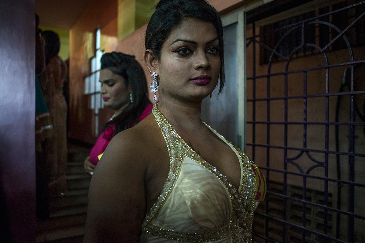 Shivani, a transgender woman from Chennai, before her turn to go onstage during Miss Koovagam 2014. Image by Sami Siva. India, 2014.