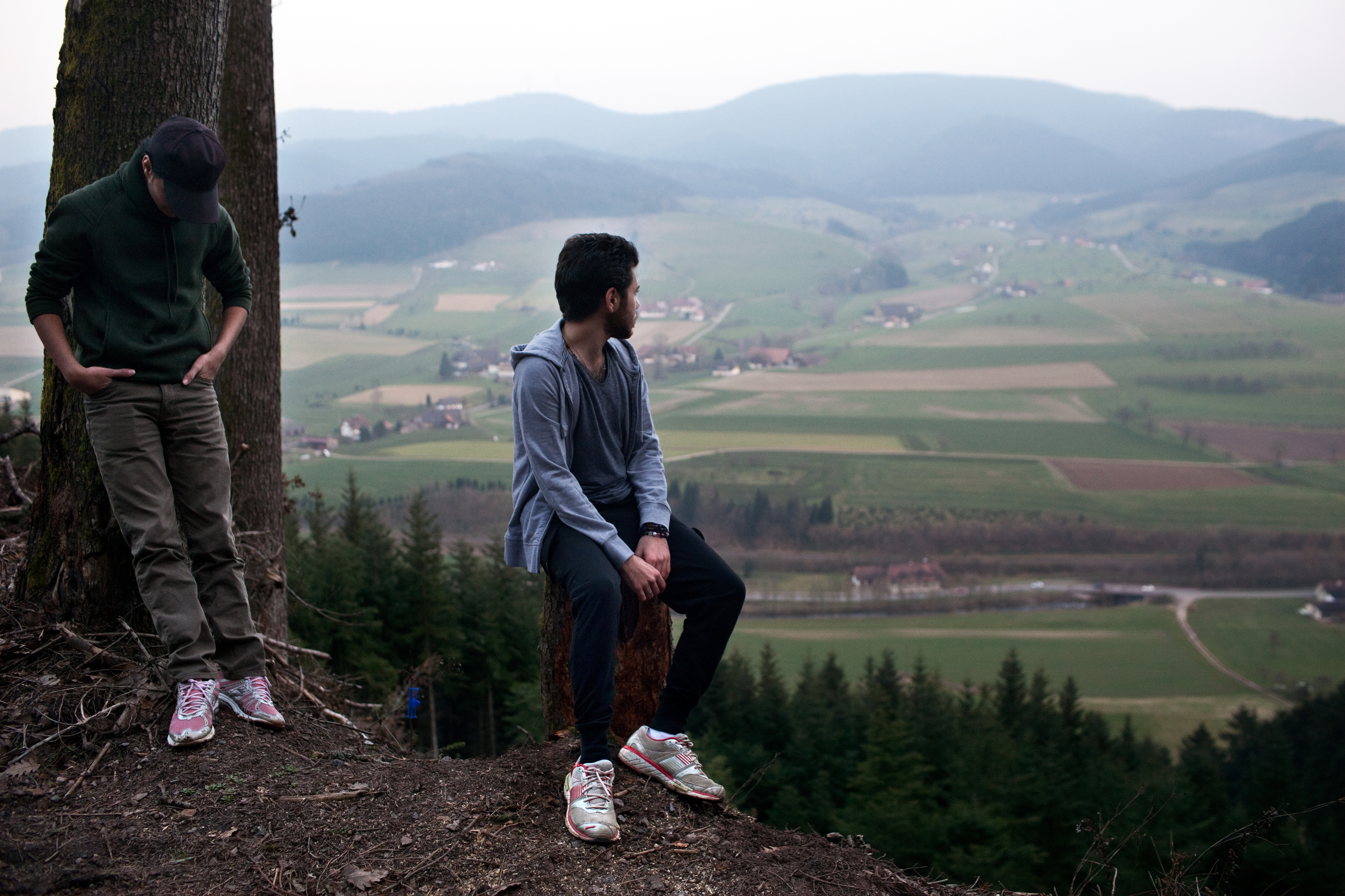 Rafat and Naif on the overlook in the Black Forest near Zell am Hammersbach, Germany. Image by Holly Pickett. Germany, 2014. Rafat and Naif on the overlook in the Black Forest near Zell am Hammersbach, Germany. Image by Holly Pickett. Germany, 2014.