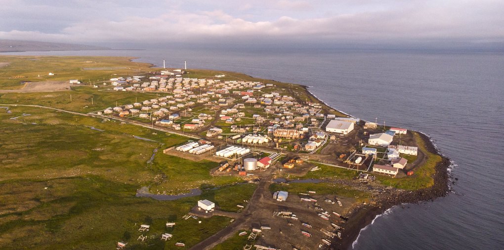 The village of Savoonga, with a population of about 700, spreads along the shores of St. Lawrence Island in the northern Bering Sea, giving residents a ringside seat to the effects of climate change. Most residents are Siberian Yup’ik, a Native people who also live along the northeast Russia coast. Image by Steve Ringman. United States, 2019. The village of Savoonga, with a population of about 700, spreads along the shores of St. Lawrence Island in the northern Bering Sea, giving residents a ringside seat to the effects of climate change. Most residents are Siberian Yup’ik, a Native people who also live along the northeast Russia coast. Image by Steve Ringman. United States, 2019.