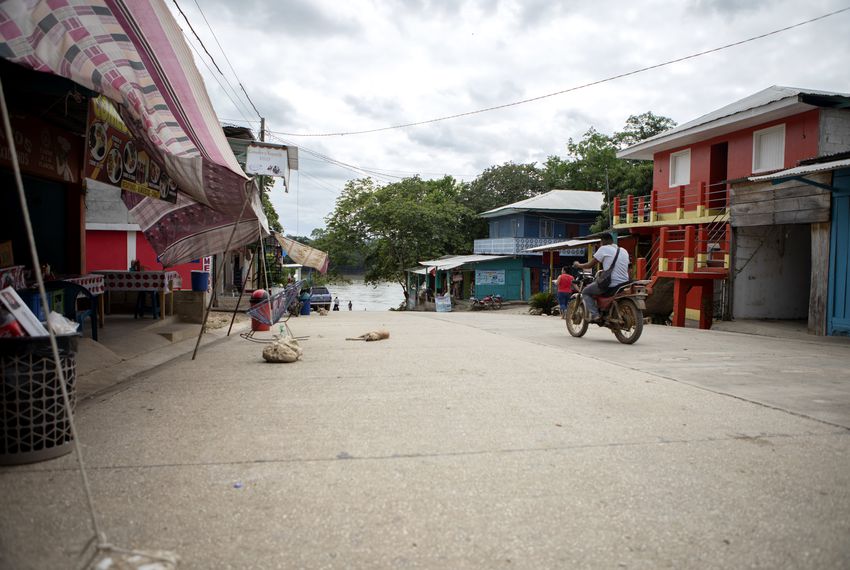 The main street in La Técnica, Guatemala, leads to a boat ramp on the Usumacinta River, which forms the international border with Mexico. Image by Miguel Gutierrez Jr. Guatemala, 2019. The main street in La Técnica, Guatemala, leads to a boat ramp on the Usumacinta River, which forms the international border with Mexico. Image by Miguel Gutierrez Jr. Guatemala, 2019.
