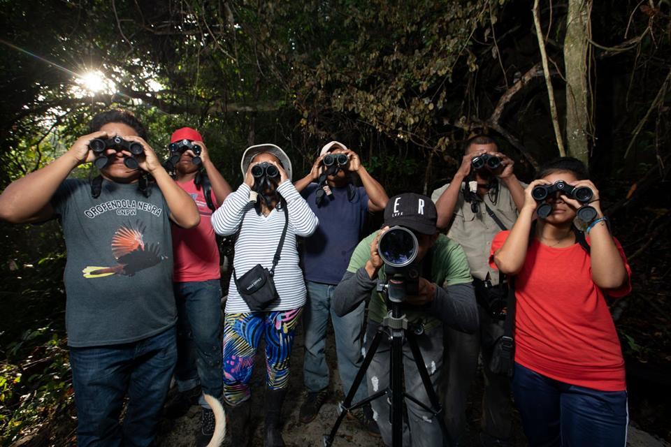 Wounnan bird watchers of Puerto Lara, Darien gap, Panama. Image courtesy of Guido Bilboa/La Prensa. 2019. Wounnan bird watchers of Puerto Lara, Darien gap, Panama. Image courtesy of Guido Bilboa/La Prensa. 2019.