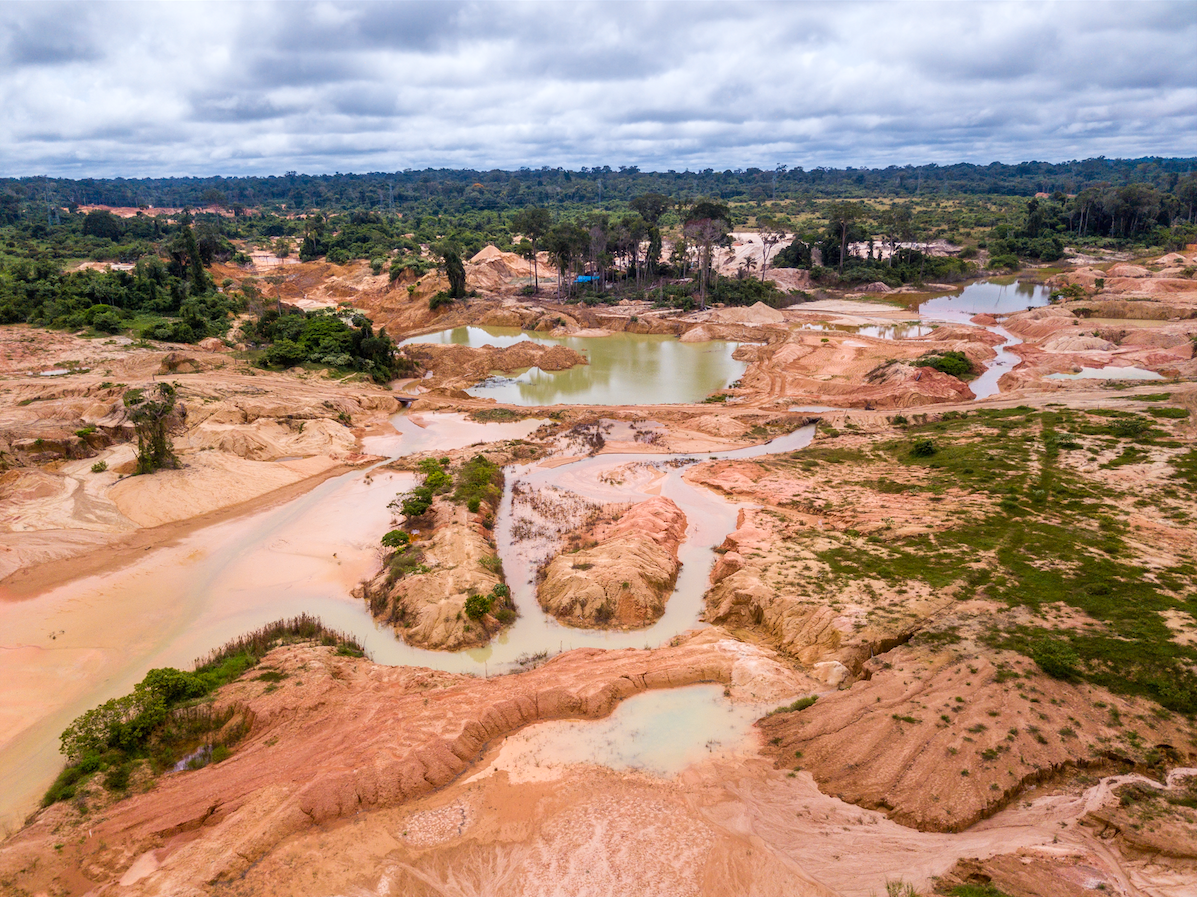Aerial view of deforested area of the Amazon rainforest caused by illegal mining activities in Brazil. Image courtesy of Shutterstock. Brazil, date unknown.
