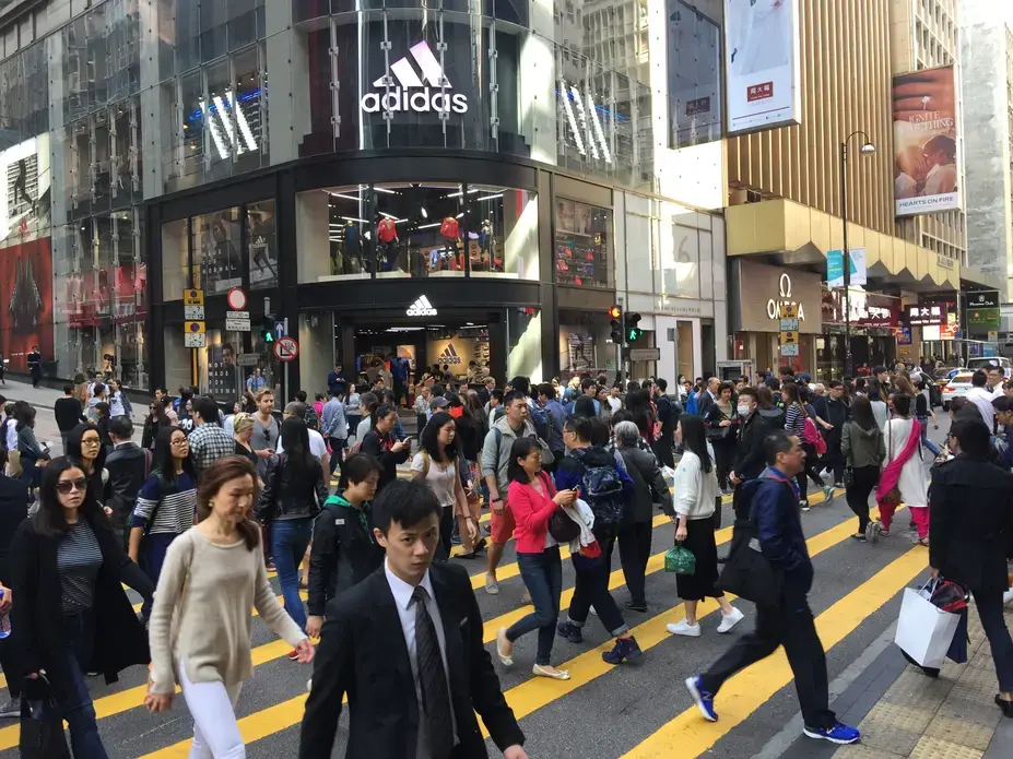 A workday street scene from the "Central" neighborhood, in Hong Kong, which was the scene of unprecedented anti-government protests in 2014. Image by Howard W. French. China, 2017.