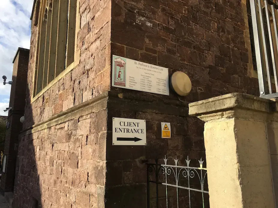 Client's entrance to St. Petrock's, a homeless charity based in Exeter. Image by Caitlin Bawn. England, 2016.