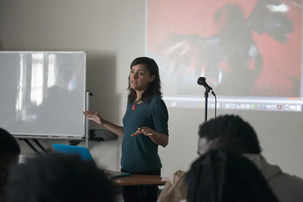 Pulitzer Center grantee Allison Shelley speaks to Soul of the City students at Richard Wright Public Charter School about photojournalism and her work in Haiti. Image by Jordan Roth. United States, 2016.