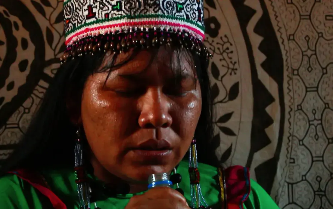 Coming from a long lineage of Shipibo practice, Karina Garcia&nbsp;Ríos breathes in 'the medicine' before serving it to her patients.&nbsp;Image by Natalie Hutchison. Peru, 2017.