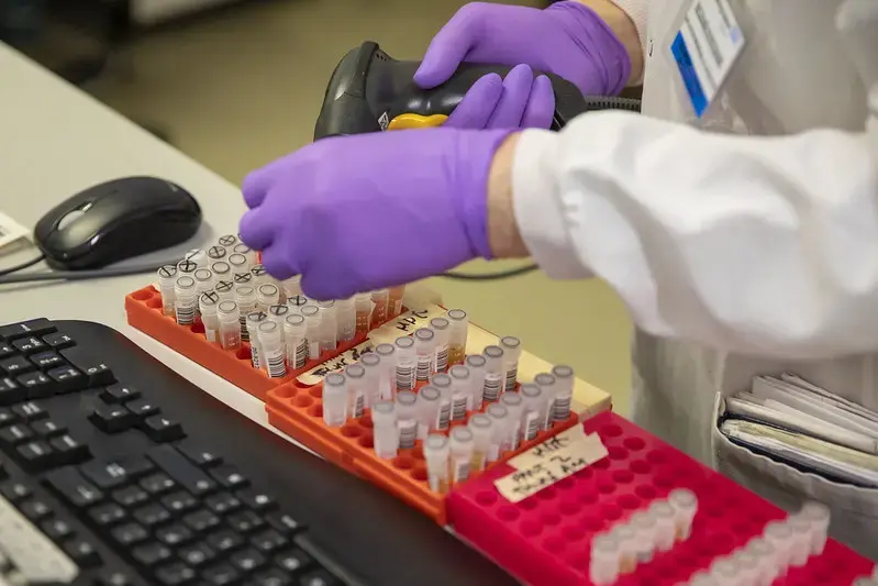 Researchers at a coronavirus testing laboratory in Leeds. Image courtesy of HM Treasury via Creative Commons. United Kingdom, 2020.