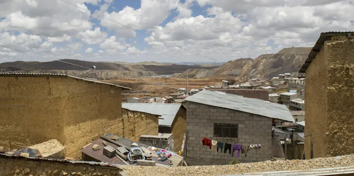 The Raúl Rojas open-pit mine seen from Paraghsa, one of the worst affected neighbourhoods in Cerro de Pasco. The pit stretches for 1.2 miles and is over 1,000 feet deep. Image by Ricardo Martinez.