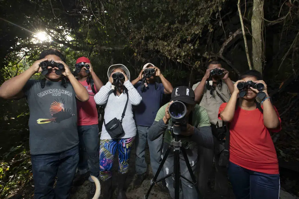 A group of seven Wounaan men and two women in Puerto Lara decided to start monitoring and recording birds in their Darién forests. Image by Alexander Arosemena. Panama, 2019.