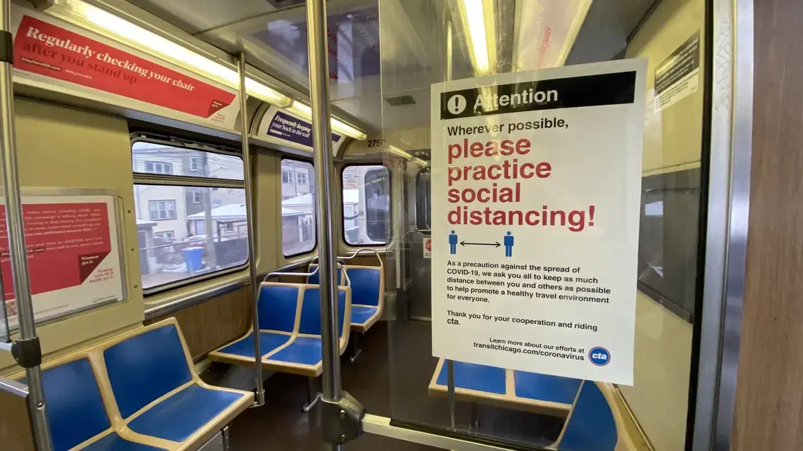 The inside of an empty CTA car. Image by Reed Mansour / Wikimedia Commons. United States, 2020.