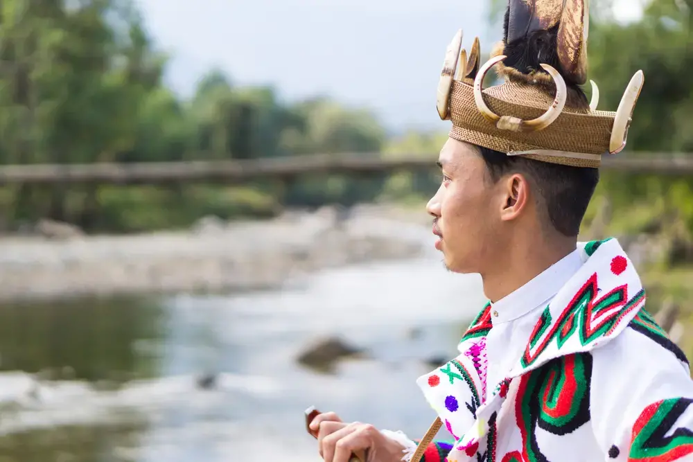 Kachin Boy at Jade Stream, Ziadam Village, Kachin State. Image via Shutterstock. Myanmar, 2020.