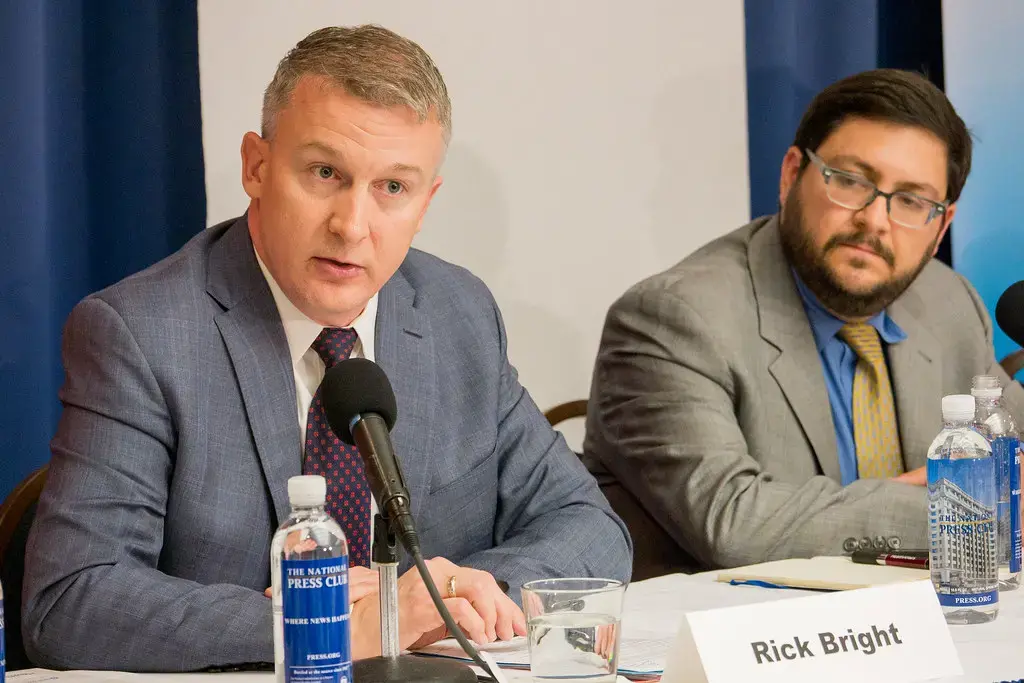 Rick Bright (left), former director of the Biomedical Advanced Research and Development Authority (BARDA), alleges in a whistleblower complaint that officials punished him for refusing to deliver funds to pharmaceutical firms run by "cronies." Image by Alliance for Health Policy / Creative Commons. United States, 2016.