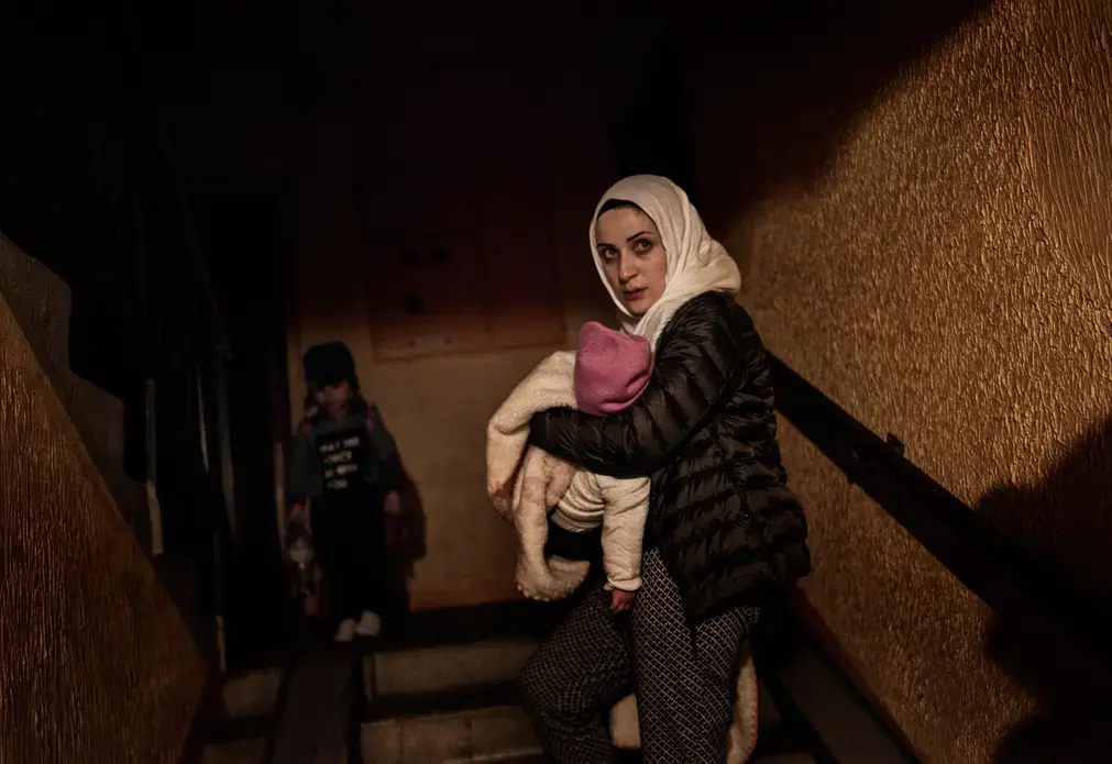 A first glimpse of home. Syrian refugee Taimaa Abazli arrives in Estonia to start the next chapter of her life in Europe. Image by Lynsey Addario. Estonia, 2017.