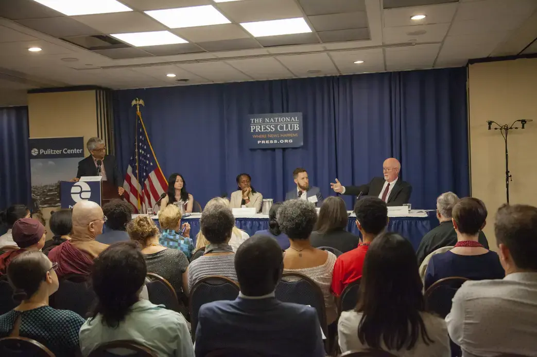 Fred de Sam Lazaro (far left) discusses religion and peacebuilding with Cathy Otten (second from left), Oge Onubogu (center), Danny Gold (second from right), and Shaun Casey (far right). Image by Jin Ding. Washington, D.C., 2019.