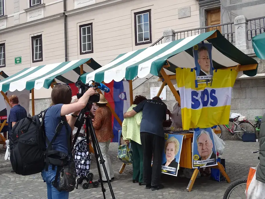 The media focuses its attention on the Slovenian Democratic Party (SDS)&nbsp;as they campaign in the city center. SDS&nbsp;won the election with a 24.4 percent&nbsp;majority vote.&nbsp;Image by Olivia Watson. Slovenia,&nbsp;2018.