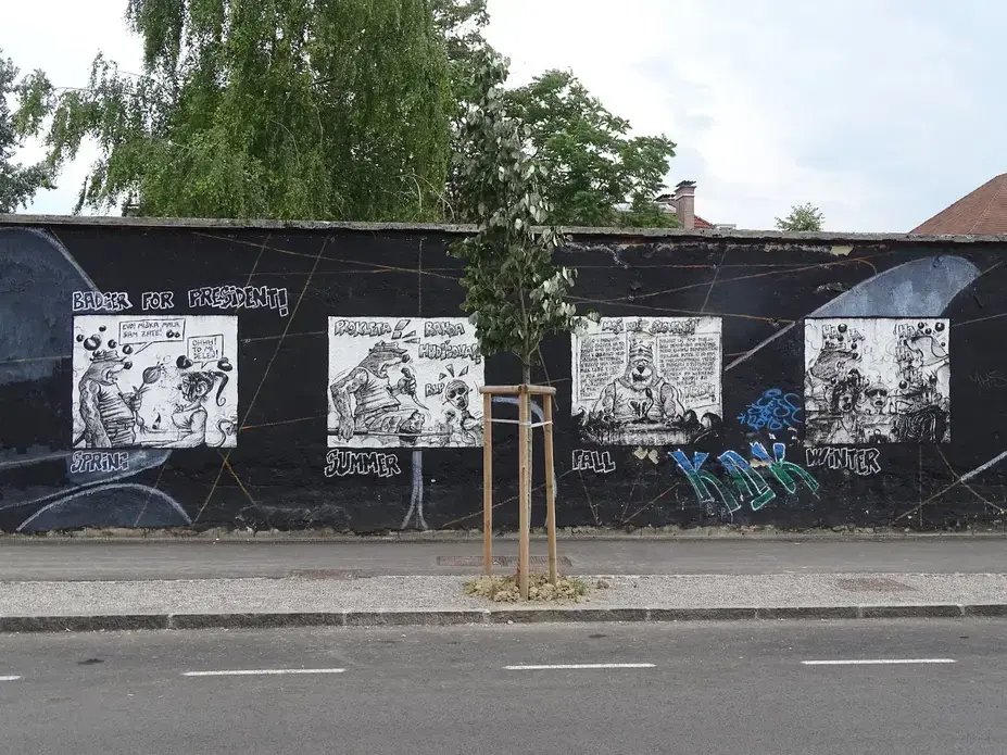 'Badger for President' street art. &nbsp;The spring section pokes fun of a scandal during which President Borut Pahor allegedly said to a dancer 'Yes, pretty girl, dance for me.' &nbsp;The fall section refers to the government feeding lies to the people for more than 20 years. Image by Olivia Watson. Slovenia,&nbsp;2018.