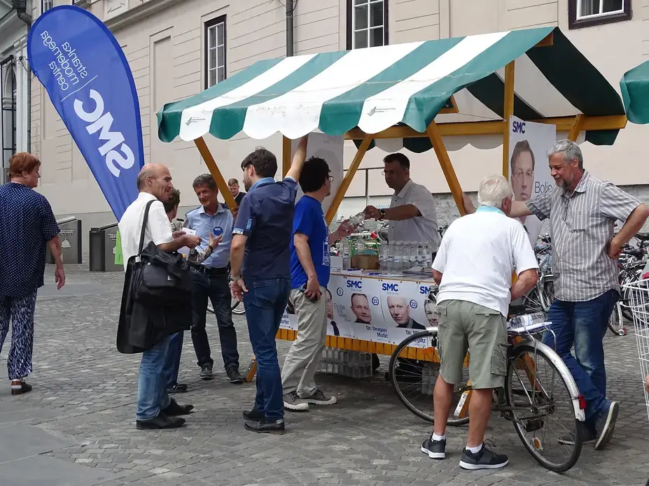 Prime Minister Miro Cerar's Modern Centre Party campaigns in the city center of  Ljubljana before the election. Image by Olivia Watson. Slovenia, 2018.