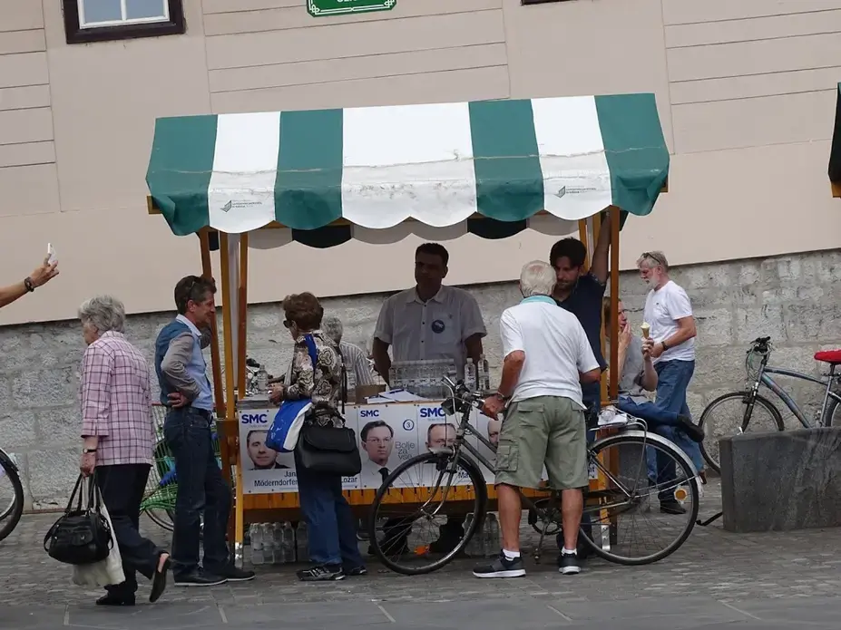 Cerar's Modern Centre Party campaigns in the city center before the election. Image by Olivia Watson. Slovenia, 2018.