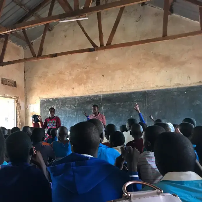Primary school students participate in an educational session on the topic of sexual violence. Image by Keishi Foecke. Uganda, 2019.