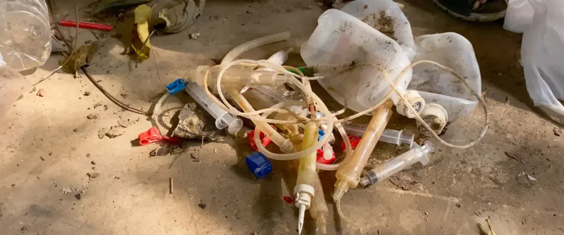 Medical waste found in the Cisadane River in Tangerang, Indonesia. Image by Adi Renaldi. Indonesia, undated.
