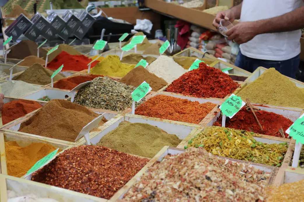 A spice shop in the Muslim Quarter of Jerusalem's Old City. Za'atar, an herb mix ubiquitous in the region's cuisine, once grew wild all over what's now in the West Bank. A 1977 Israeli law criminalized the harvesting of the herb. Israelis say it protects an endangered plant species. Palestinians say it's another way to erase their identity and limit their ability to cook their traditional dishes. Image by Carly Graf. West Bank, 2019.