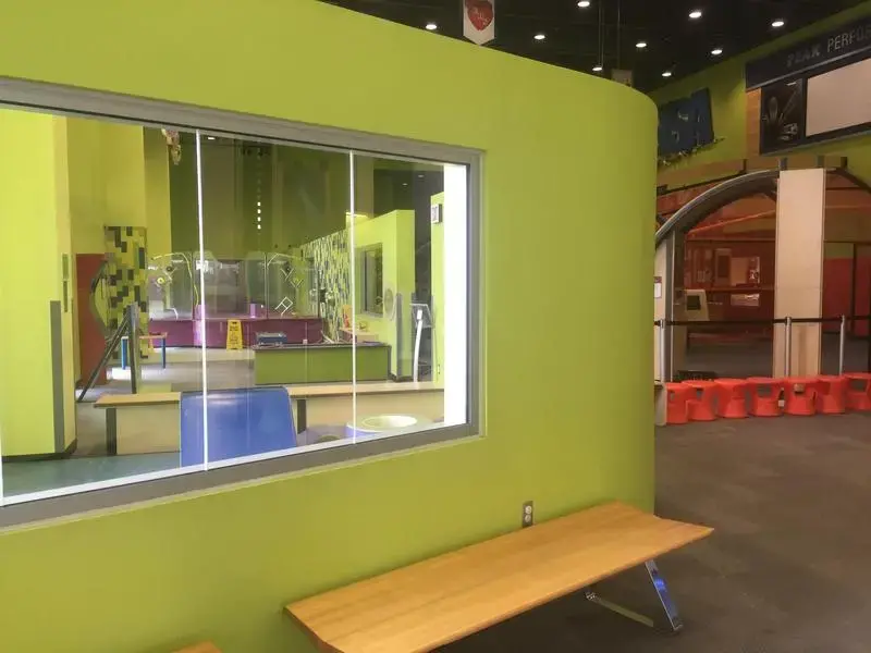 While the Peoria Riverfront Museum was finally able to reopen July 1 under Phase 4 of the Restore Illinois Plan, its "high touch" exhibits remain closed, and school field trips have been canceled. Image by Breanna Grow /WCBU. United States, 2020.
