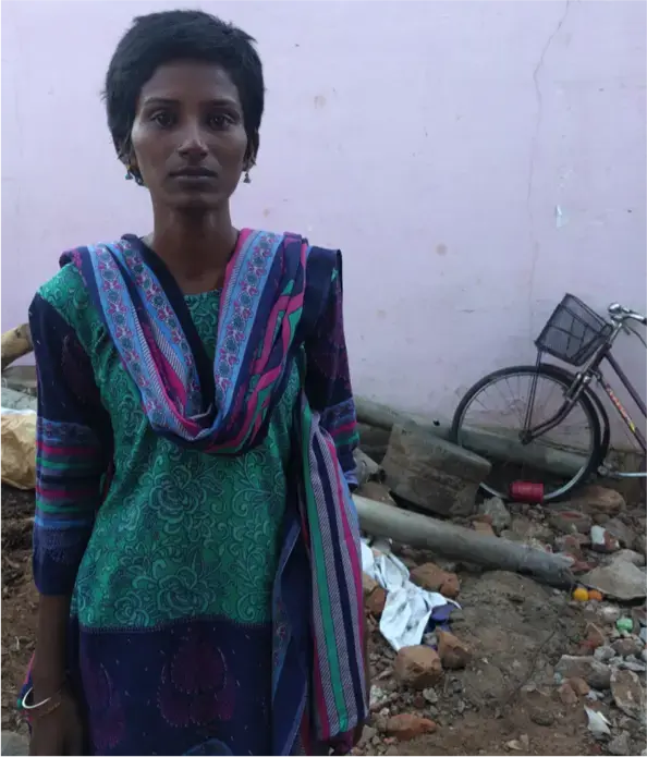 Nalina has to raise two children on her own with a 4,000 rupee salary. She hopes that some day she will get a government job so that she can give her daughters a better life.&nbsp;Image by Praveena Somasundaram. India, 2017.