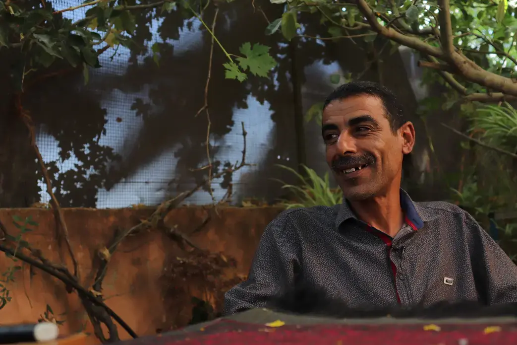 Ziad and his family once had plenty of water to irrigate their land and sustain their home. Today, his village of Burqin faces severe water shortages. Much of the water that does exist is contaminated due to untreated sewage from settlements and the Palestinian cities of Ramallah and Nablus nearby and chemical waste that's deposited in the area. The village has one of the highest rates of cancer in the West Bank. Image by Carly Graf. Palestine, 2019.