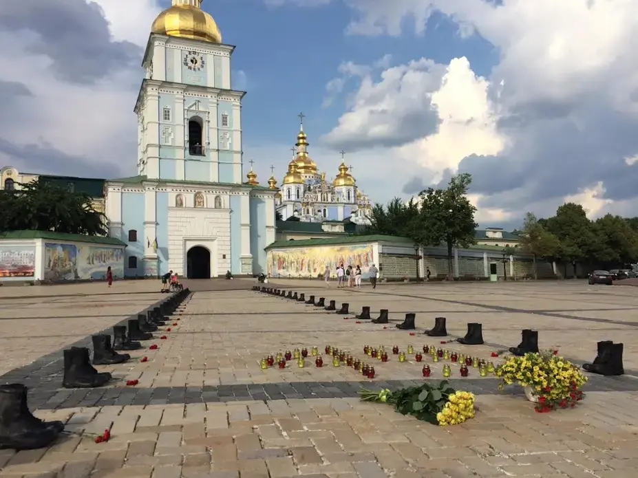 A display in front of St. Sophia’s Cathedral commemorates the loss of 40 troops and 9 crew members on June 14, 2014, when a transport plane was shot down in Luhansk. Image by Taylor Damann. Ukraine, 2019.