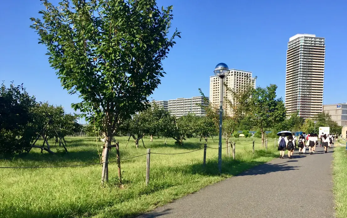 High schoolers hiding from the late summer heat in Kashiwa, Chiba, Japan. Image by Daniel Merino. Japan, 2019. 