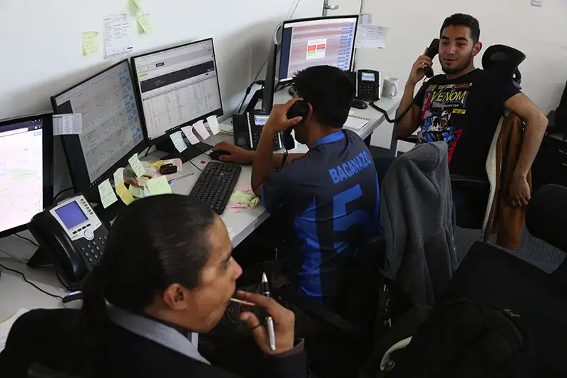 Contractors work with New Comienzos’ (New Beginnings) program. Image by Erika Schultz. Mexico, 2019.