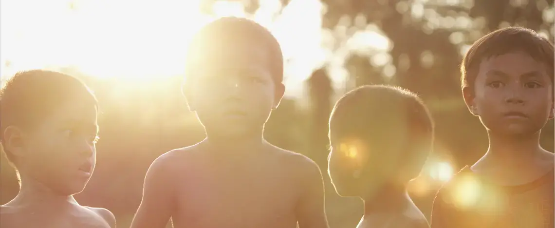 Lao village boys play soccer at sunset. Image by Erin McGoff. Laos, 2017.