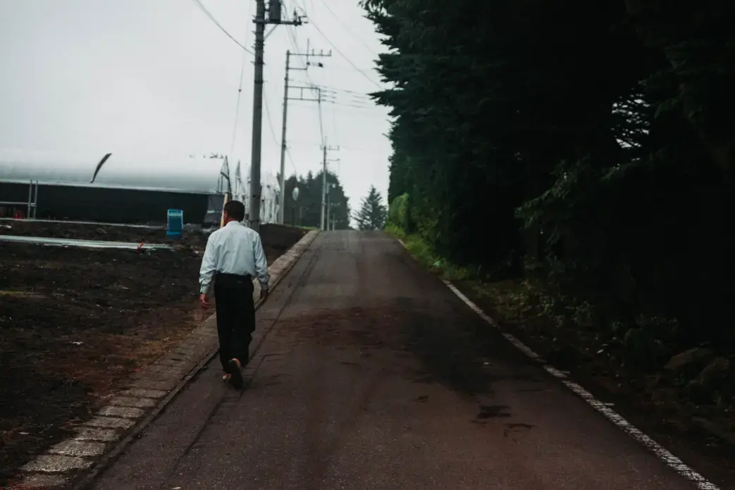 Toru Hoshikawa gives a tour of the farm.&nbsp;Image by Audrey Henson. Japan, 2019.