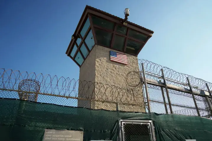 This photo, reviewed and approved by the U.S. military, shows a guard tower in the Detention Center Zone at Guantánamo Bay, Cuba. Image by Doug Mills / The New York Times. Cuba, 2019.