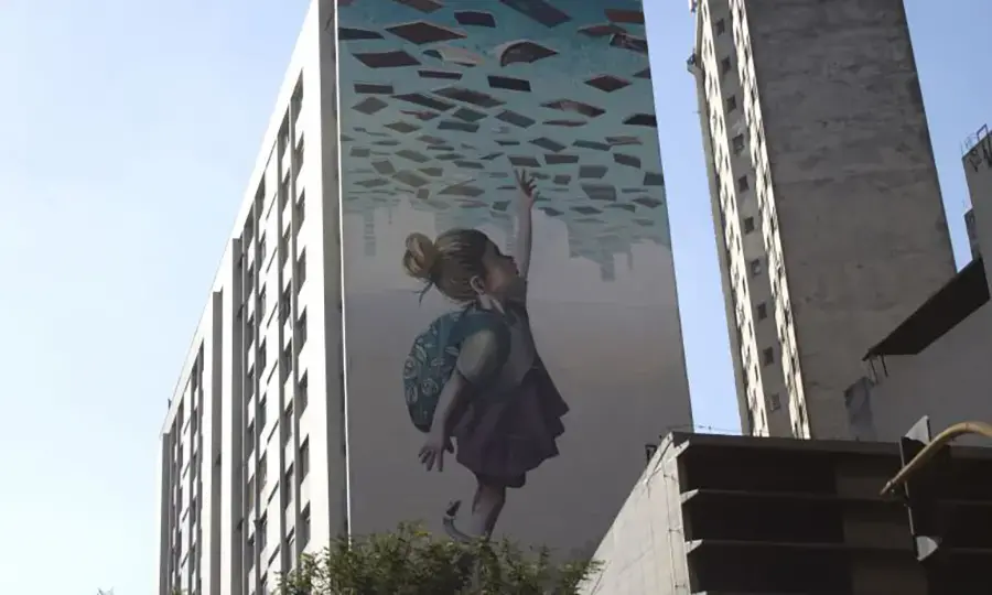 Although Brazilians have the right to education, as illustrated by this artwork on a São Paulo building, it is still out of reach for many—including, too often, people with autism. Image by Amanda Michelle Gordon. Brazil, 2018.