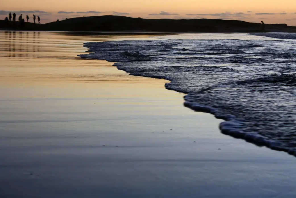 The tide rolls in on the shores of Cape Town, South Africa. Prospecting rights for offshore mining cover 10 percent of the country's exclusive marine economic zone. Image by Mark Olalde. South Africa, 2016.