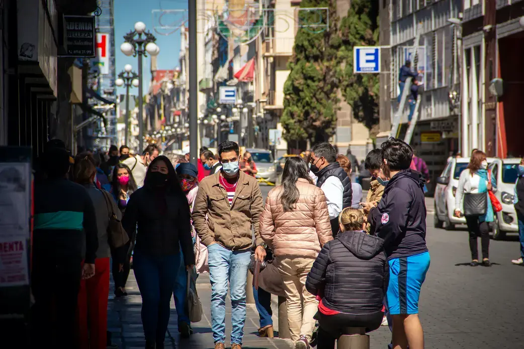 Residents of Puebla, Mexico, take to the streets and resume activities after seven months of quarantine due to the COVID-19 pandemic. Image by Alejandro_Munoz / Shutterstock. Mexico, 2020.