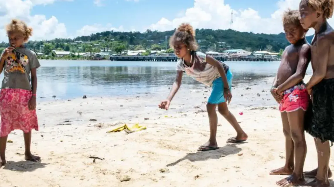 Children playing in Malaita, where sea levels are rising. Image by Monique Jaques. Papua New Guinea, 2019.