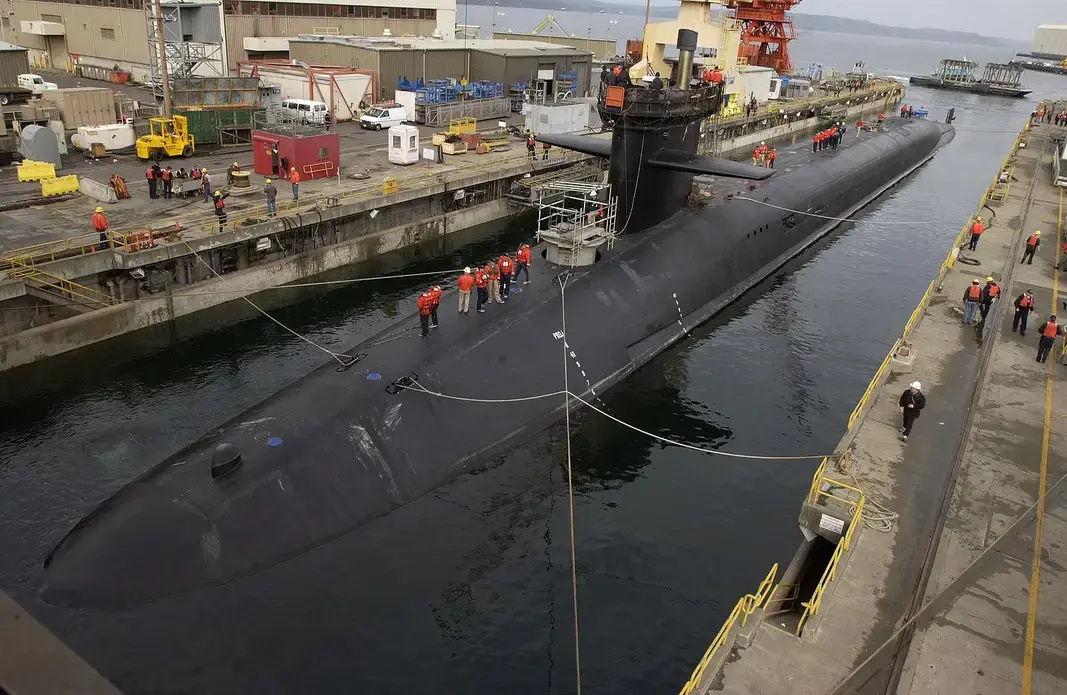 The USS Michigan, a Trident class nuclear submarine, in for repairs at the naval yards in Washington. Image by U.S. Navy. USA, 2002.