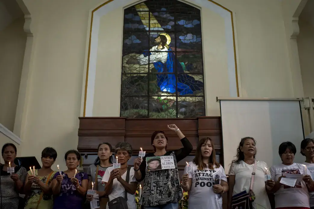 Nanette Castillo (center) and other mothers of drug war victims protest the war on drugs at a solidarity event organized by the ecumenical activist group Rise Up in October. Image by Eloisa Lopez. Philippines, 2018.