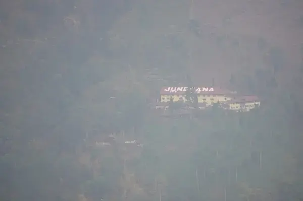 View of Jungpana through winter fog. Image by Esha Chhabra. India, 2017.
