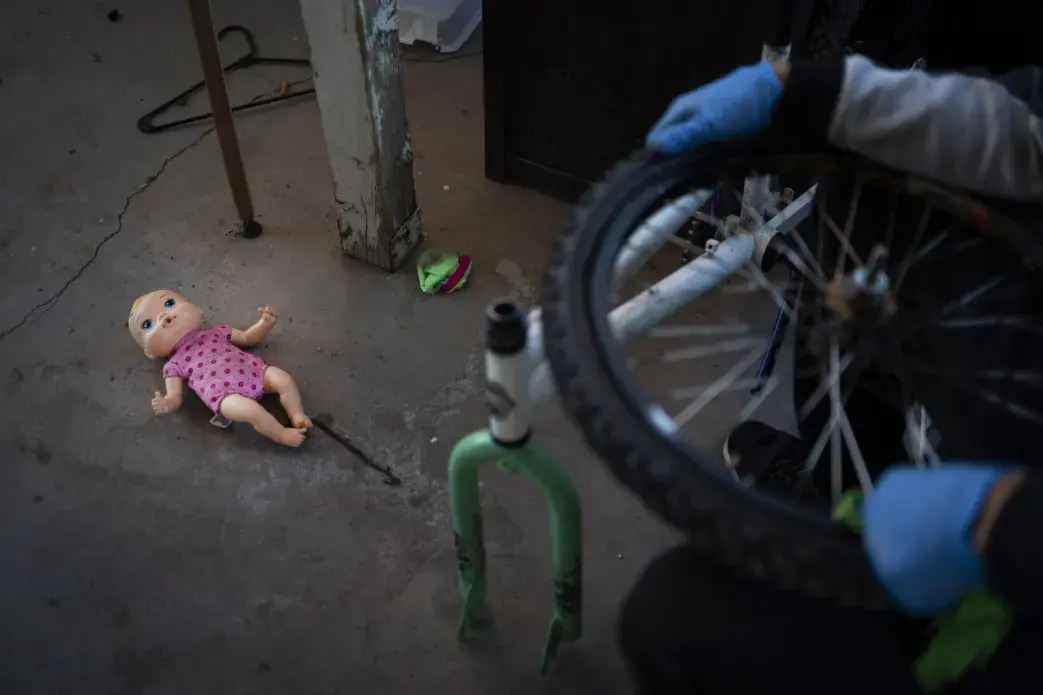 A doll belonging to a grandchild of Norma Flores lies on the ground in the backyard of her home in Henderson, Nev., Tuesday, Nov. 10, 2020. Image by Wong Maye-E / AP Photo. United States, 2020.