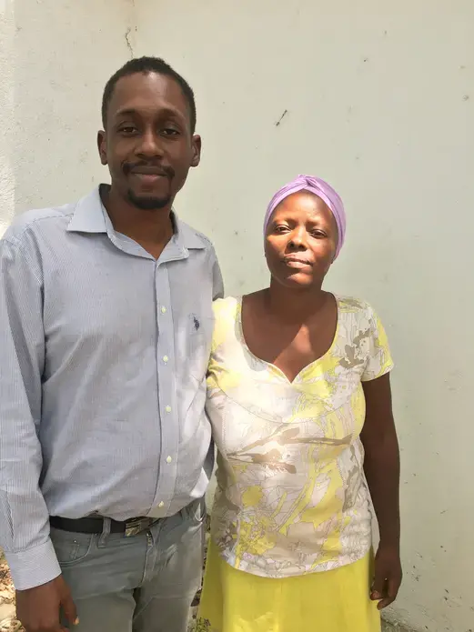 Dr. Joseph Bernard with a breast cancer patient at the Innovating Health International (IHI ) cancer treatment center in Port-au-Prince. Image by Kate Corrigan. Haiti, 2017.