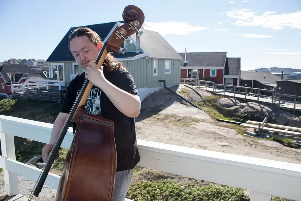 Aqqalooraq Heilman-Lennart is Arctic, and indigenous. He speaks three languages, loves jazz, and says he watches too much YouTube. Image by Amy Martin. Greenland, 2018.