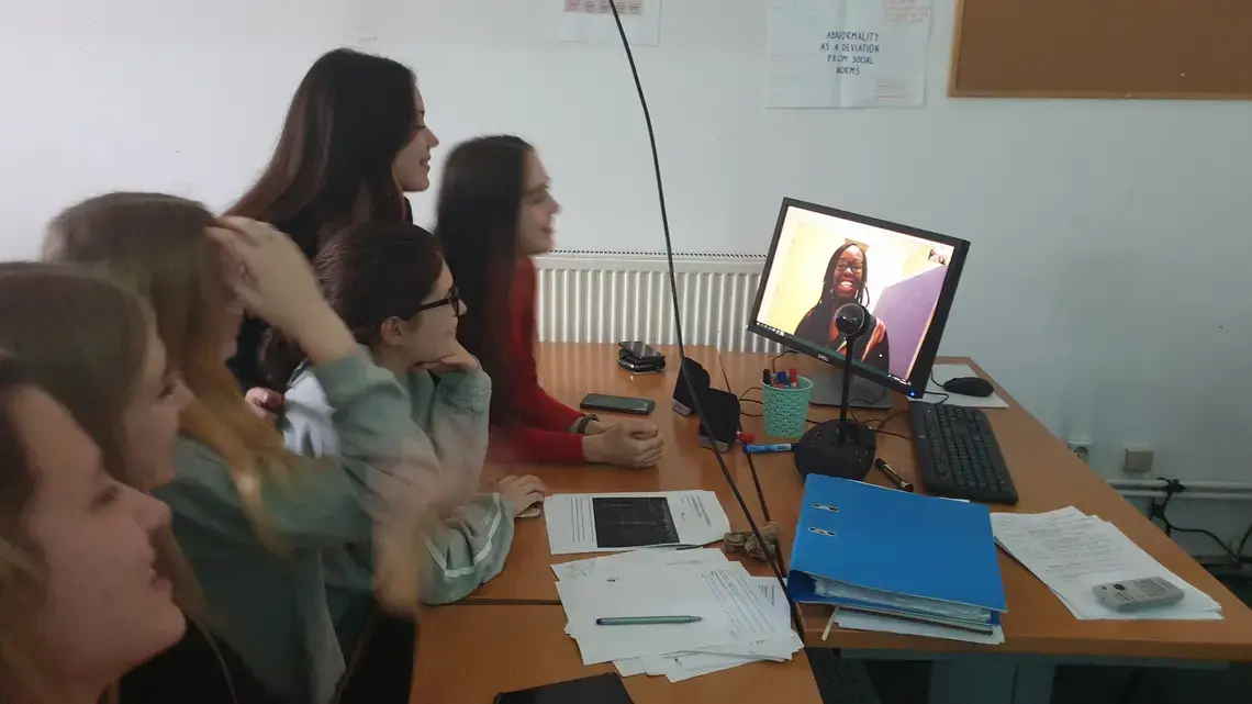 Malgorzata Kulesza - Erica Ayisi.jpg Students gather around a computer to listen to Erica Ayisi present.