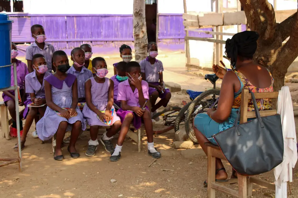 children attend class outside